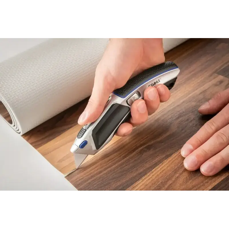 Dahle 10891 Profesional Heavy Duty Cuter con Cuchilla Trapezoidal de Acero al Carbono SK5 - Guia Automatica - Cuerpo Metalico -